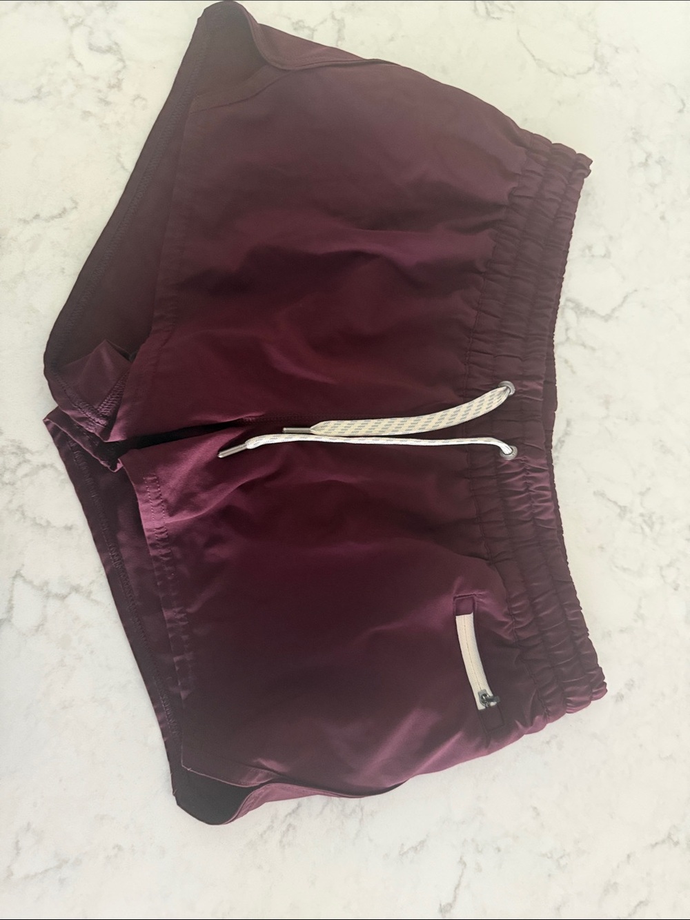 Vuori Women's Athletic Shorts in Burgundy